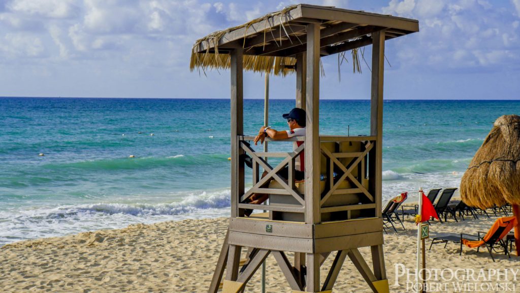 Lifeguard at Now Jade resort in Riviera Maya, Mexico. He had the best view of the ocean up there. 