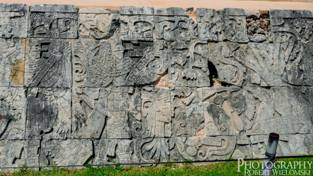 Chichen Itza Maya Stone Art Work Ancient Maya art work showing the Captain participating in human sacrifice. best ruins in mexico