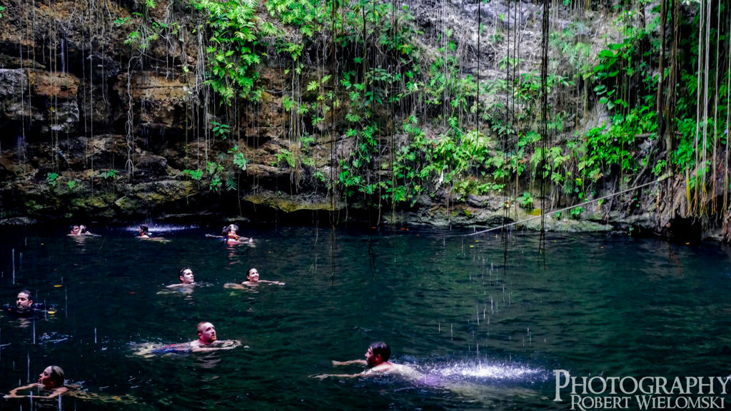 Swimming in The Sacred Cenote in Mexico.