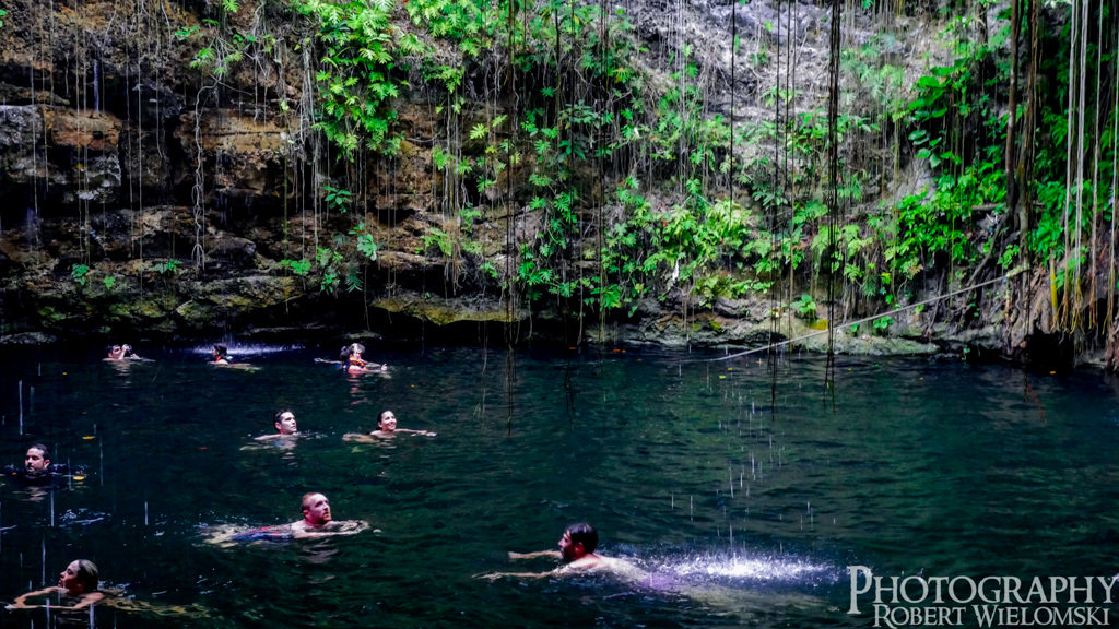 The Sacred Cenote Swimming Mexico Swimming in The Sacred Cenote in Mexico.